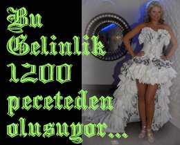 Tuğba Altıntop... DÜNYADA İLK KEZ PEÇETEDEN GELİNLİK GİYDİ...