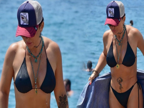 Selen Görgüzel... ŞAPKA VE GÖZLÜKLE DENİZE GİRDİ!